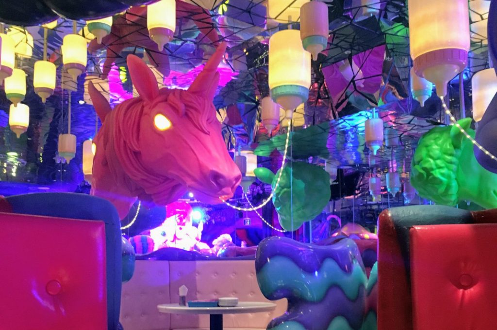 Kawaii monsters loom over patrons in Kawaii Monster café.