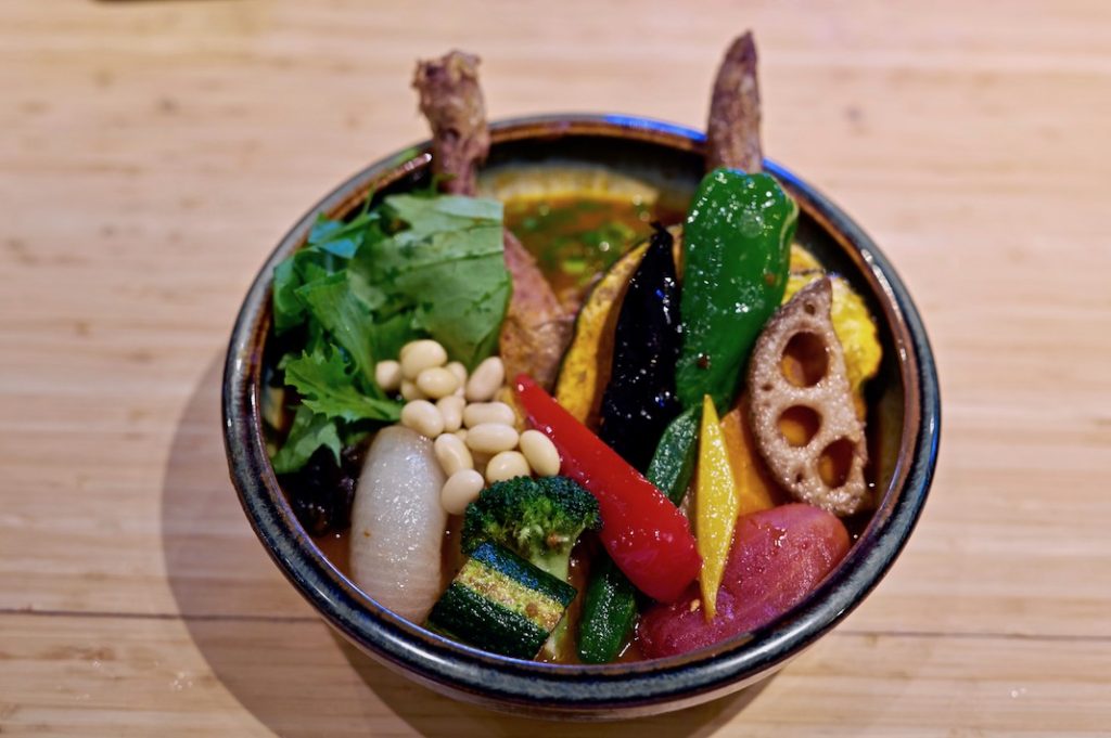 A beautiful, colourful bowl of soup curry. 