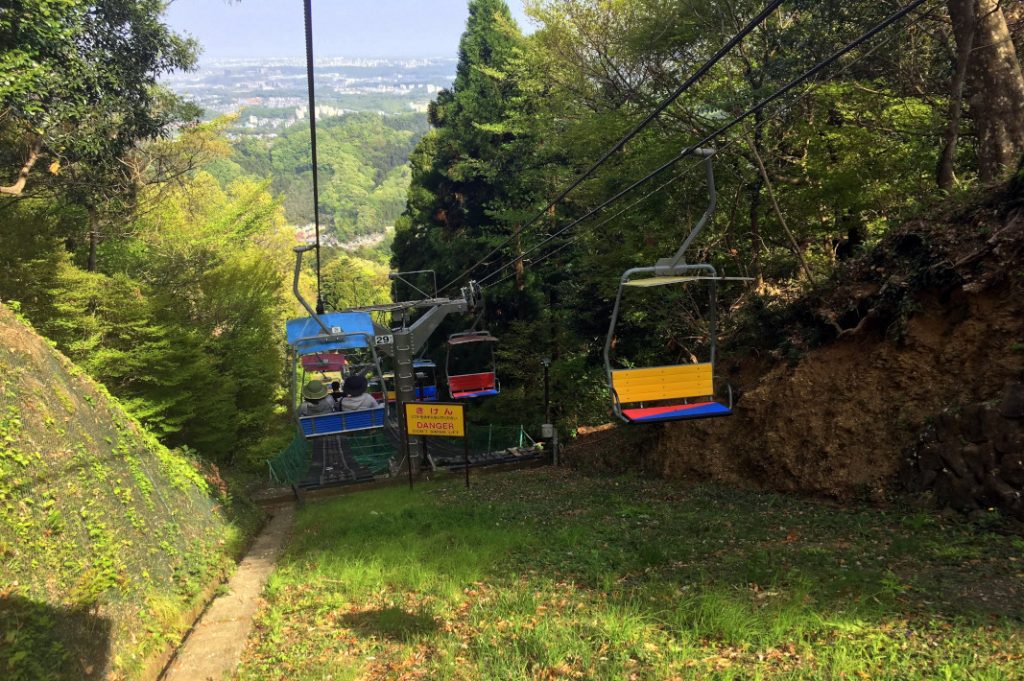 Chair lifts bring visitors halfway up Mount Takao, close to the monkey park