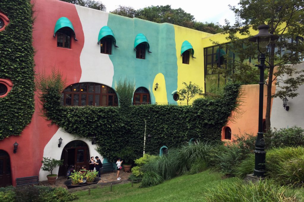 The Studio Ghibli Museum lights up the surrounding area.