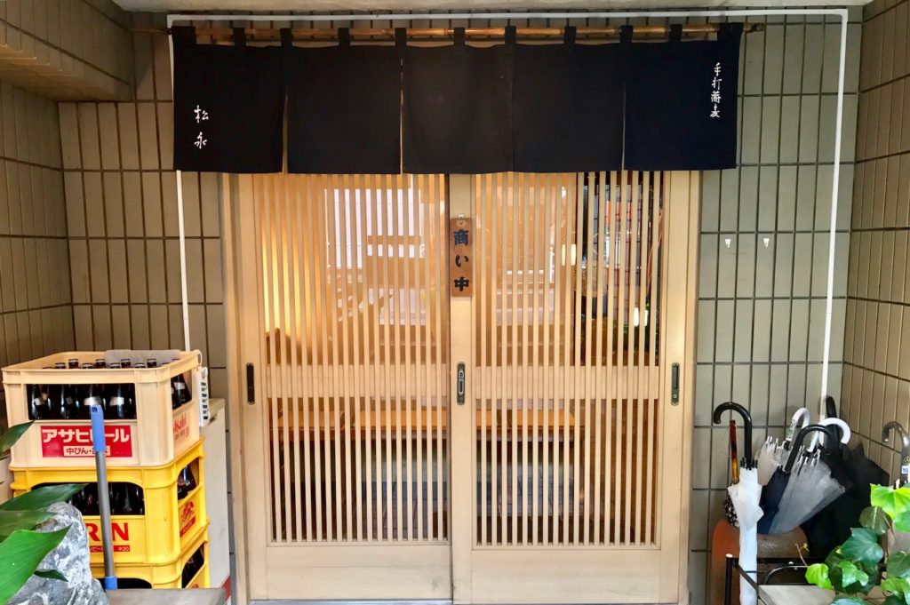 Entrance to a soba shop, showing noren curtain