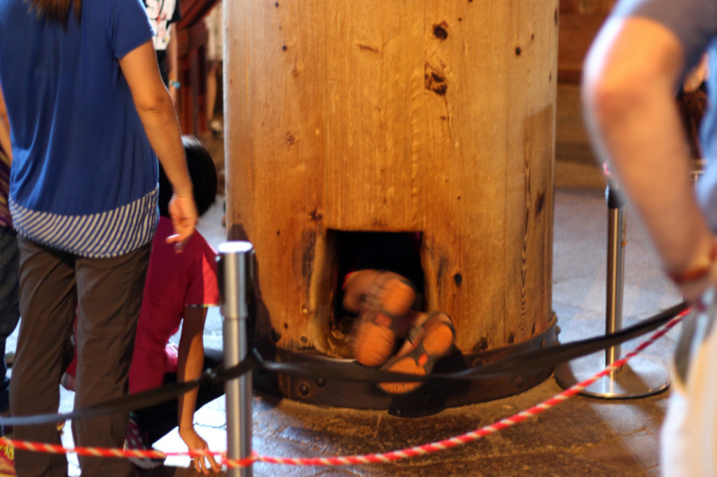 Do you dare? Look for this pole next to the Great Buddha