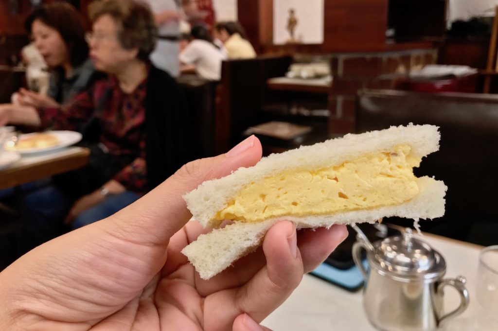 Tender omelette between slices of white bread  at Smart Coffee Kyoto