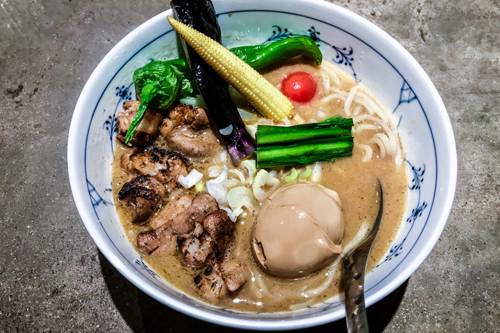 Vegetables add colour to a bowl at No Name Ramen