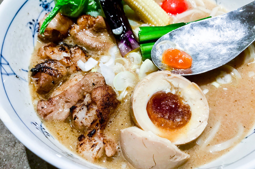 A jewel-like yolk in the ramen egg