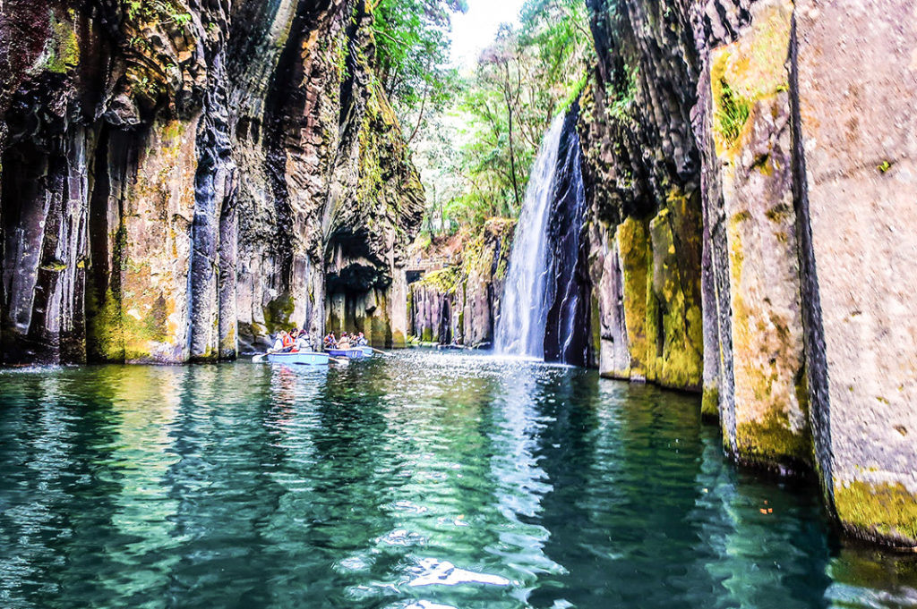 Takachiho Gorge offers tranquil waters and cascading waterfalls.
