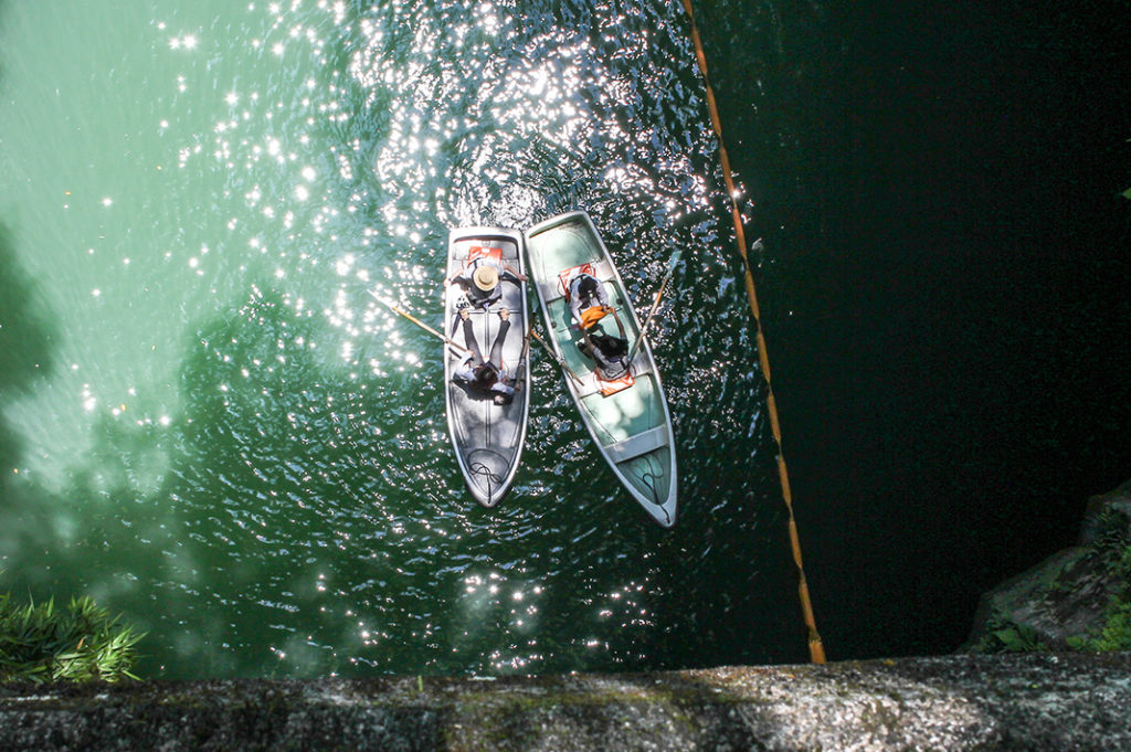 Rowing through Takachiho Gorge 