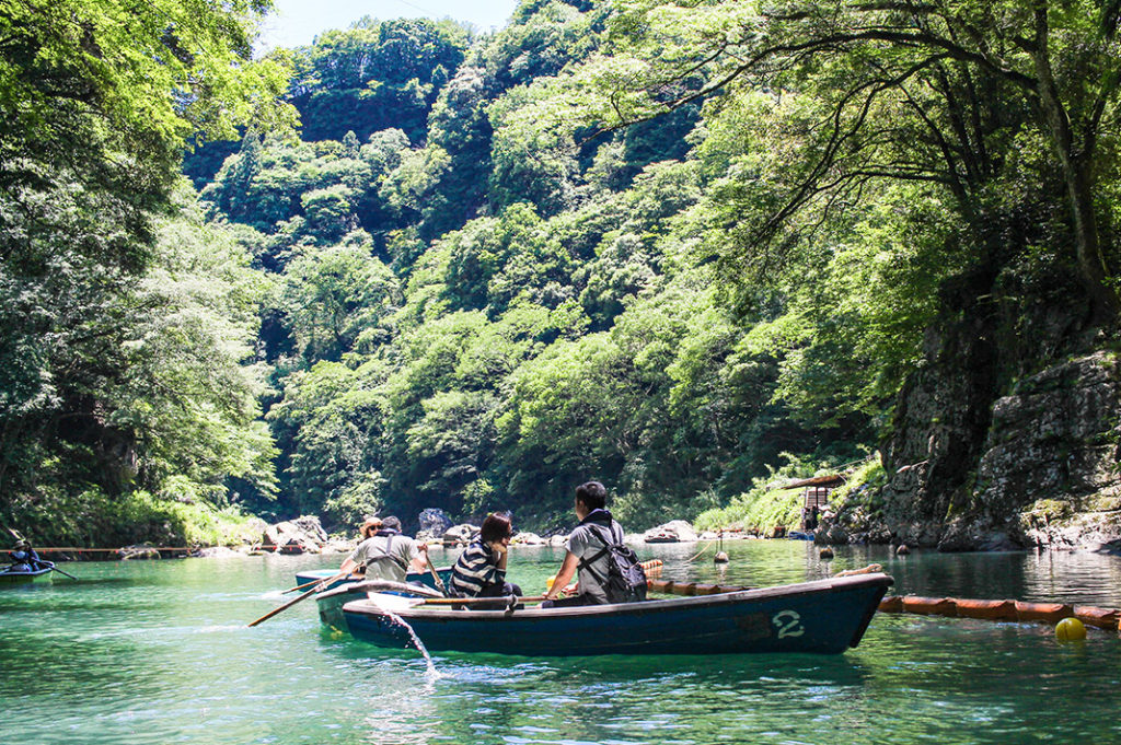 Rowing through Takachiho Gorge 