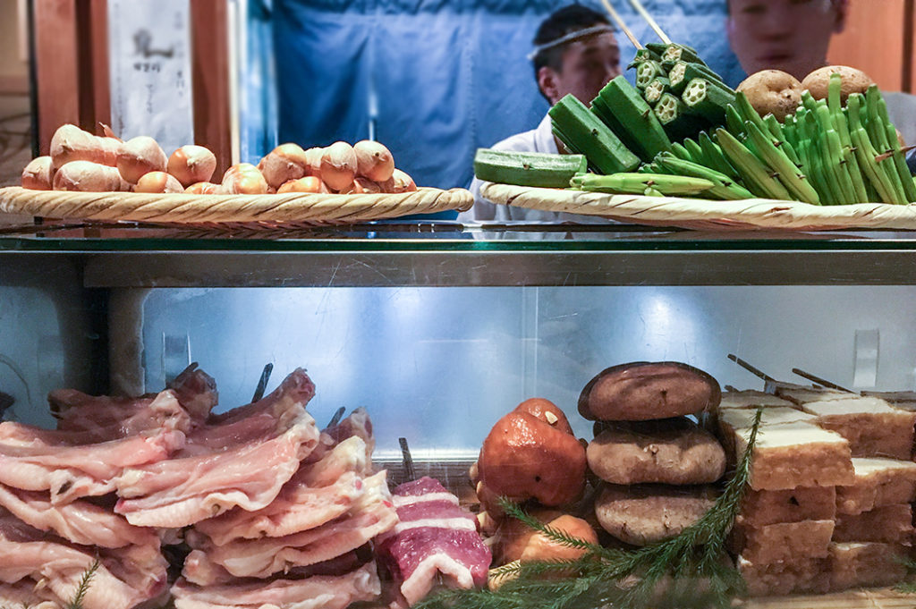 Food on display at Toriyoshi Yakitori restaurant