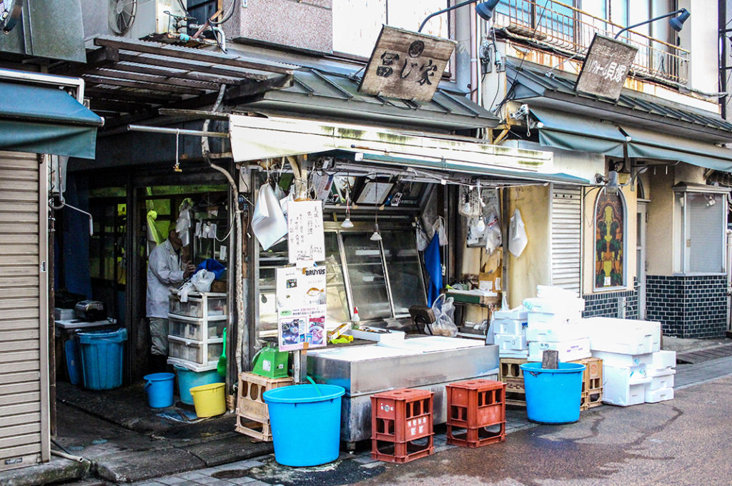 A fishmonger prepares for the day