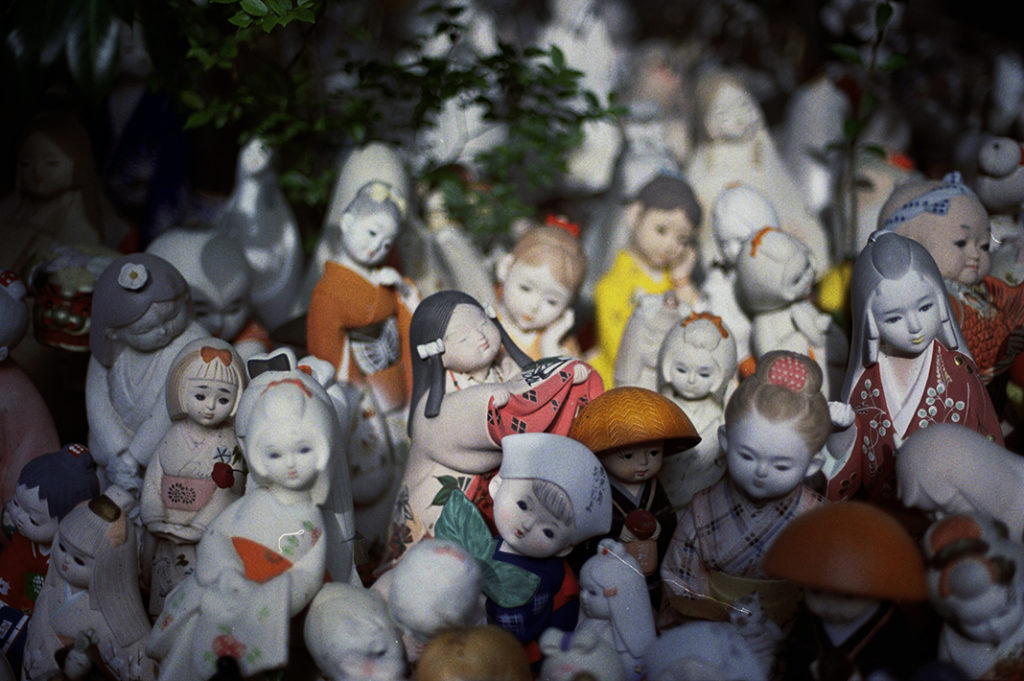 A large number of decorative dolls (these, depicting children) also 'live' in the grounds of the shrine.