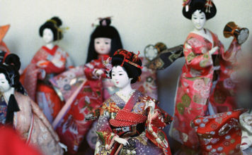 Awashima Shrine: Kada’s Hall of a Thousand Eyes Dolls line up at Awashima Jinja