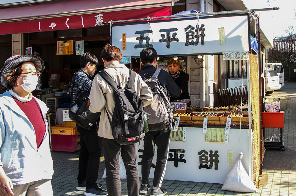 Enjoying tabe-aruki street food during your day trip to Nagatoro