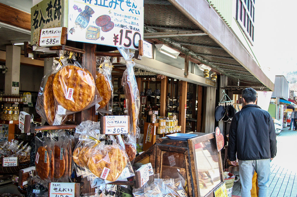 Enjoying tabe-aruki street food during your day trip to Nagatoro