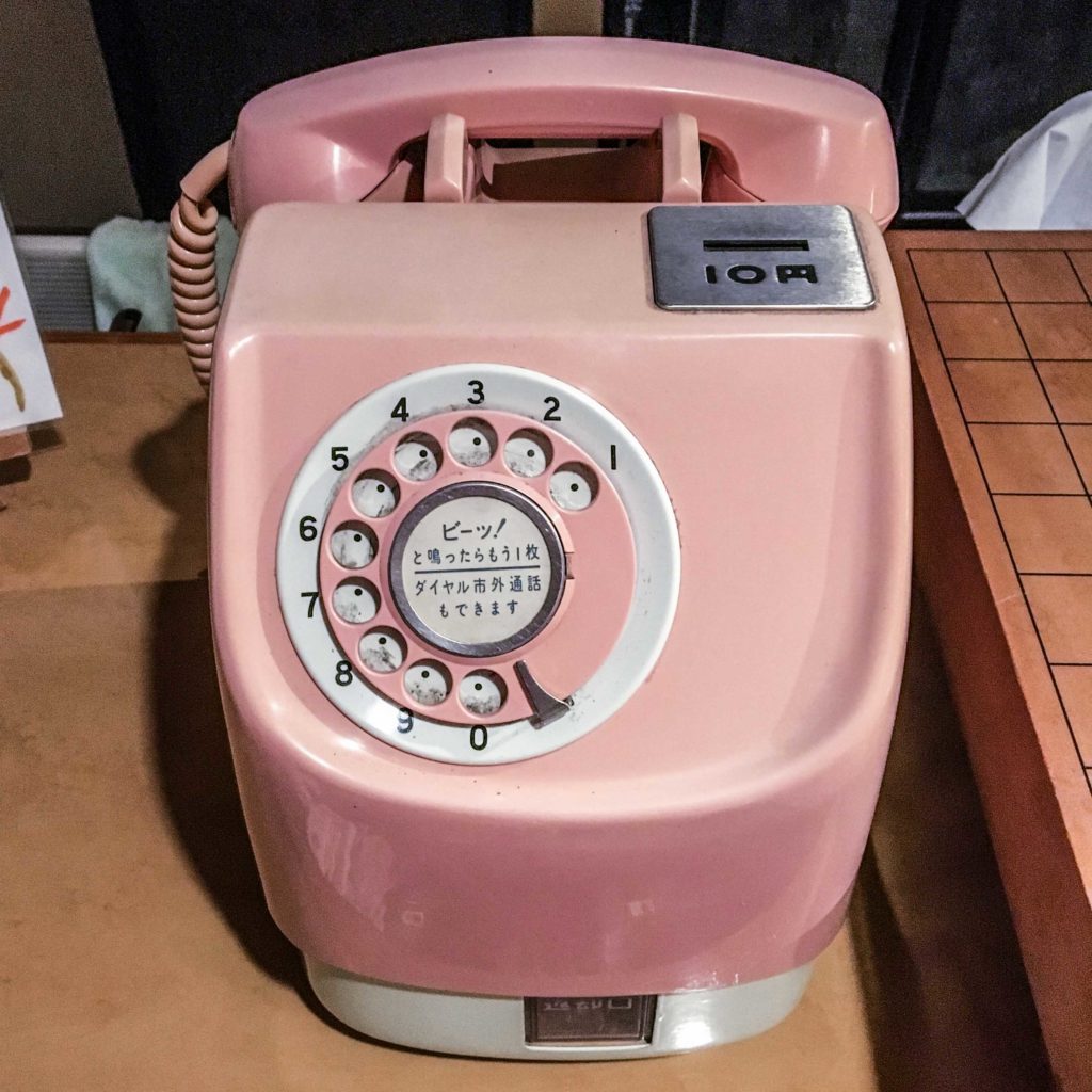 Ryokan often have quirky antiques like this vintage Japanese pay phone!