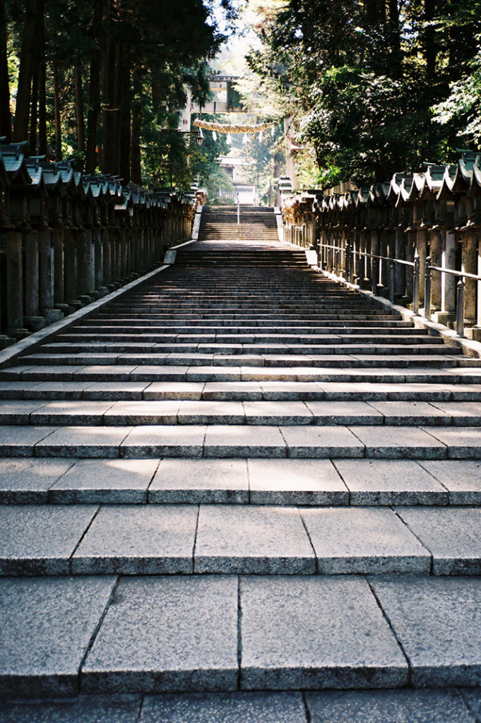 The majestic, lantern-lined San-do and Torii at the entrance of Mt. Ikoma.