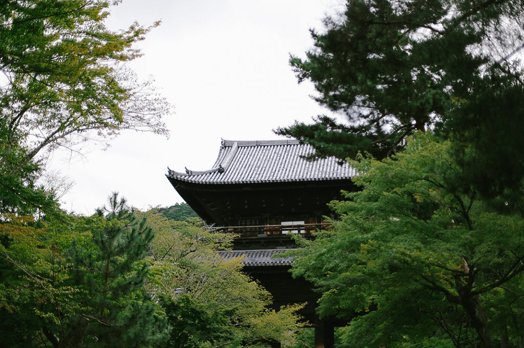 Nanzen-ji's towering Sanmon gate amongst the pine and maple trees. Tags: Zen, Rinzai Sect, Buddhist Temple.