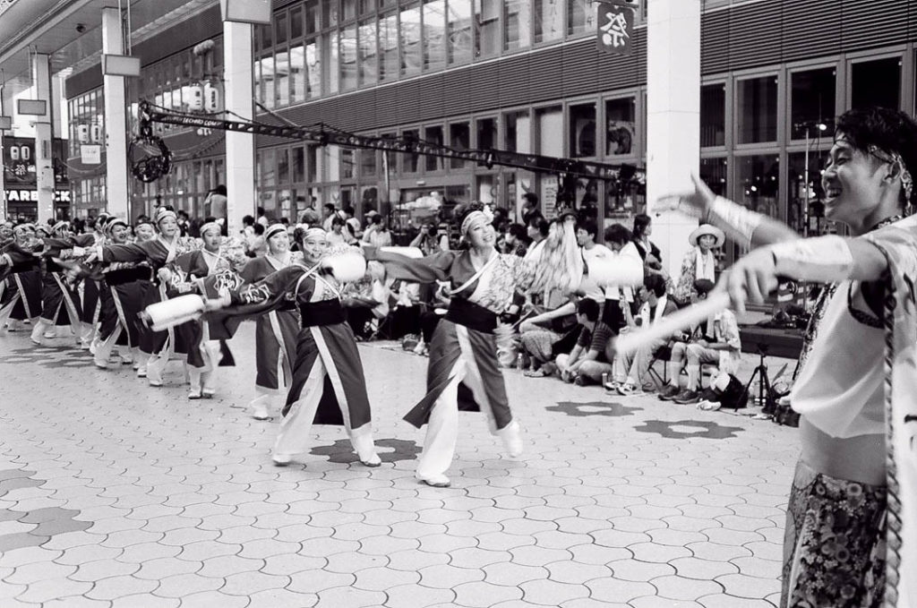 A spirited line of dancers at the Yosakoi festival in Kochi. 