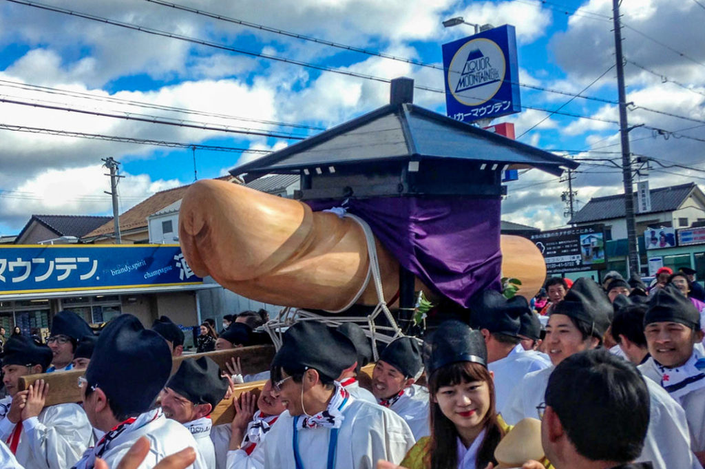 The big phallus at the Komaki Penis Festival. The crowd follows the parade back to the shrine at Honen Matsuri in Komaki