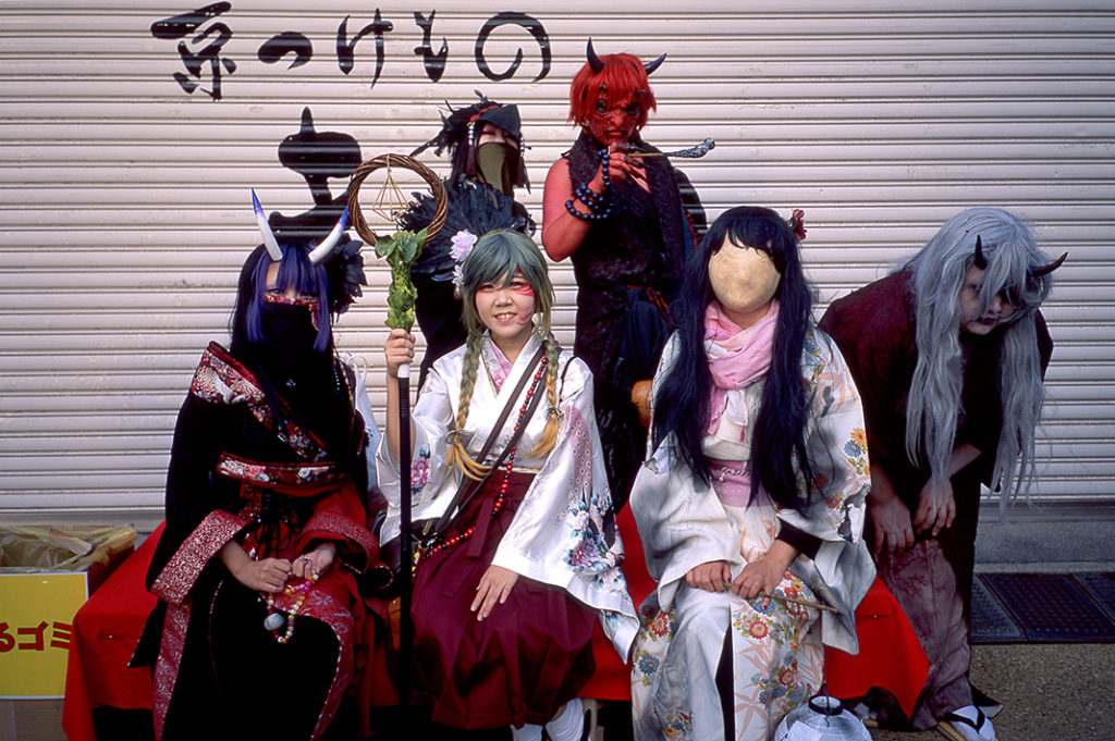 A group of teenage girls are dressed as Yokai: monsters who exist in Japanese folklore. Tags: cosplay, ghosts, ghouls