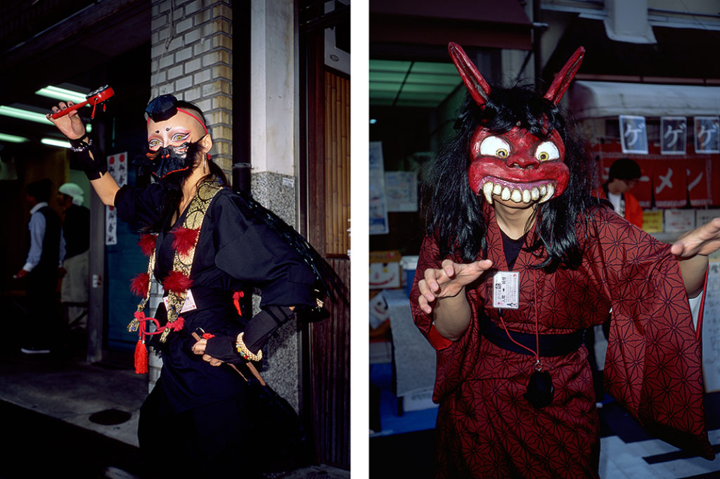 Two visitors to Kyoto's Yokai parade dressed as traditional monsters from Japanese folklore. Tags: cosplay, ghosts, ghouls