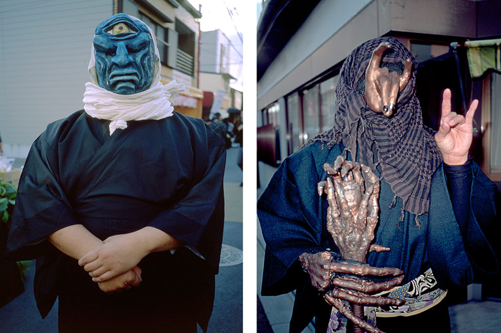 Two visitors to Kyoto's Yokai parade dressed as traditional monsters from Japanese folklore. Tags: cosplay, ghosts, ghouls