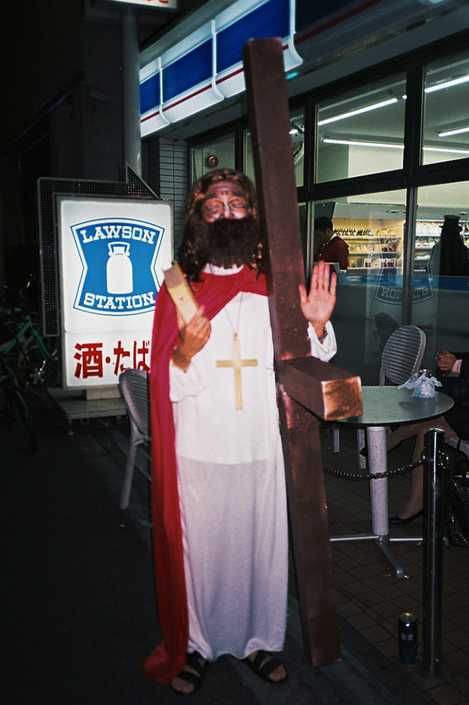 A man is dressed as Jesus.