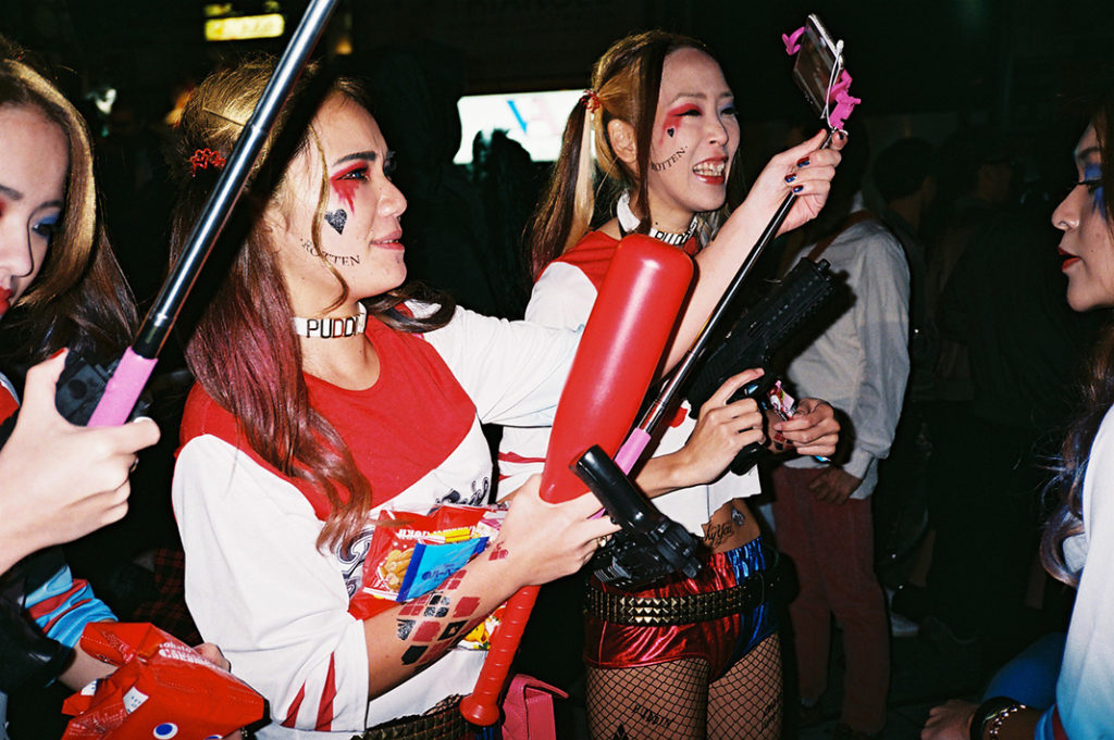 Four girls dressed as Harley Quinn at a Japanese Halloween event in Osaka, Japan. 2 points!