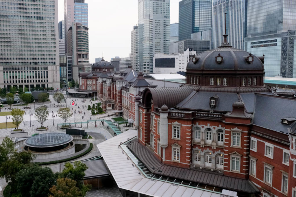 The iconic red brick facade of Tokyo Station. 