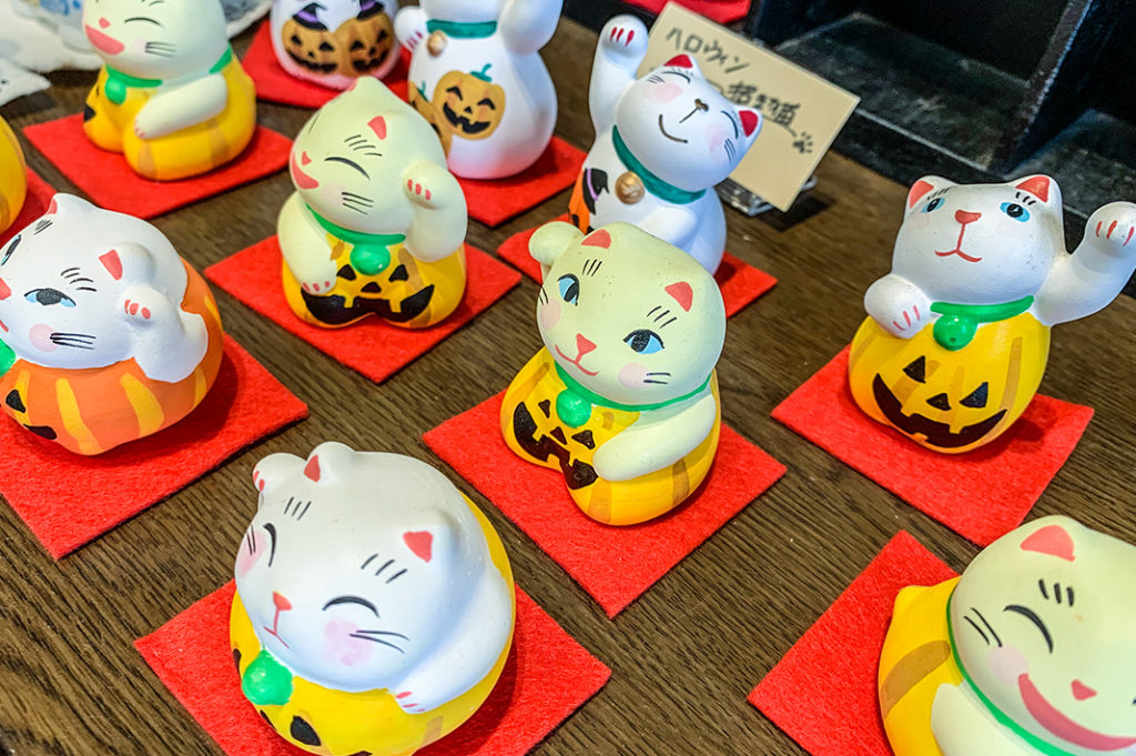 Lucky Cat statues painted for Halloween. 