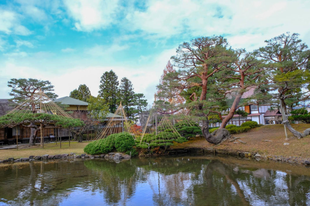 Lovely trees and teahouses in a Japanese garden. 