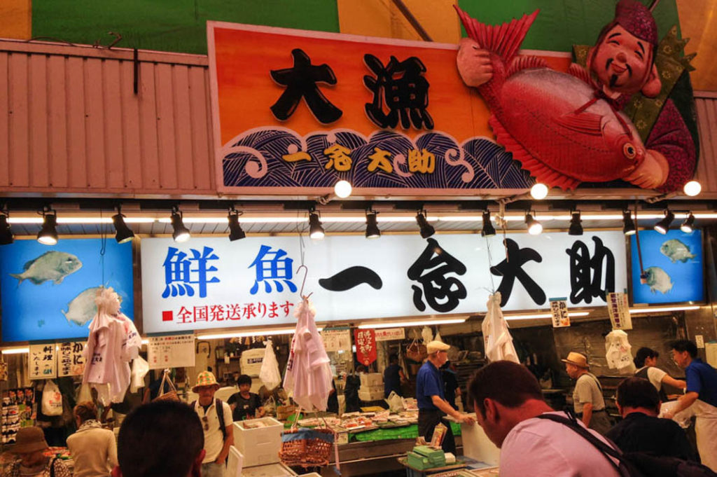 Experience a local side of Japanese culture by shopping for fish at Omicho Market.