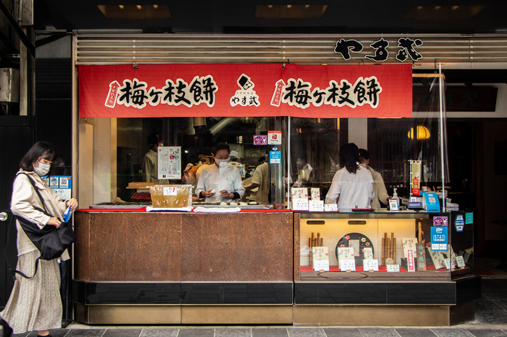 Umegae-mochi vendors along Dazaifu Tenmangu Shrine's Omotesando Shopping Street