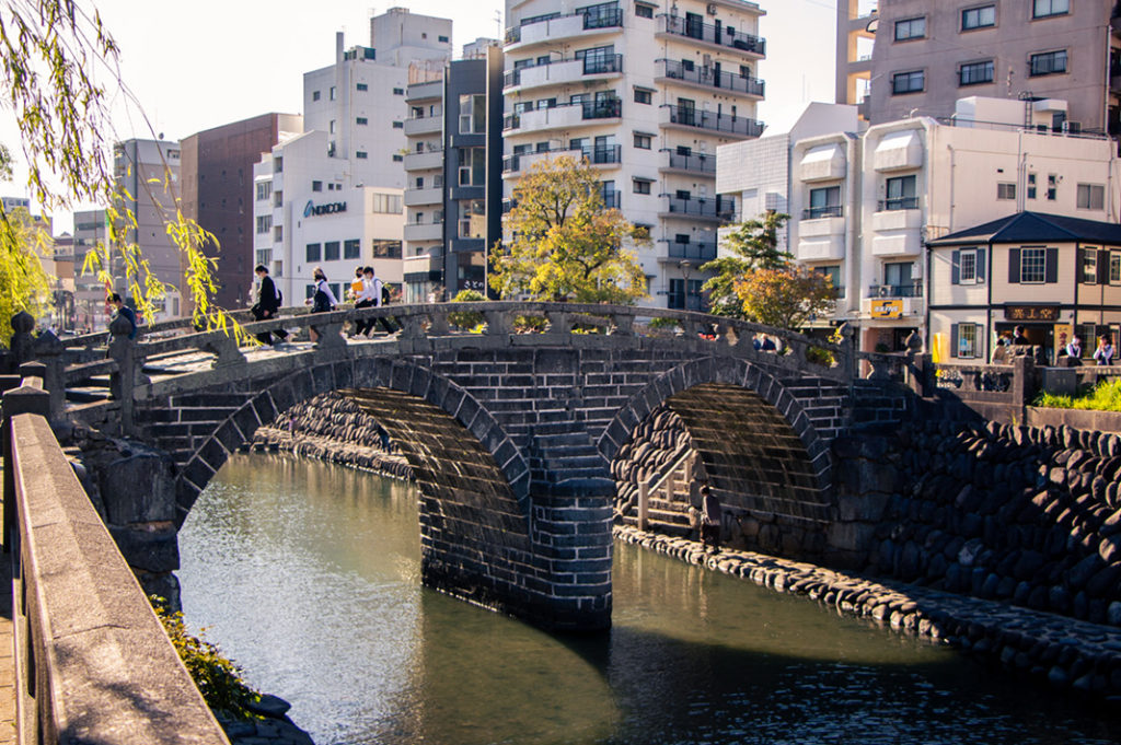 Meganebashi stone bridge is said to be one of the oldest in Japan. Its double arch design led to the nickname 'Spectacles Bridge'.