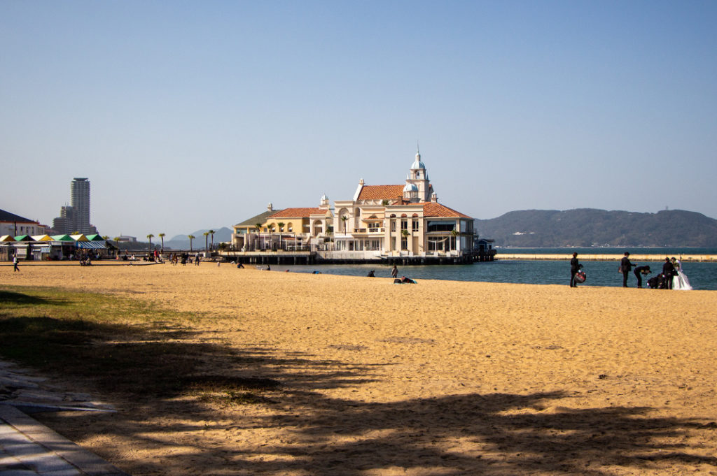 Twenty minutes west of the city, Momochi Seaside Park is a convenient Fukuoka beach that beckons travellers with golden sands & open skies.