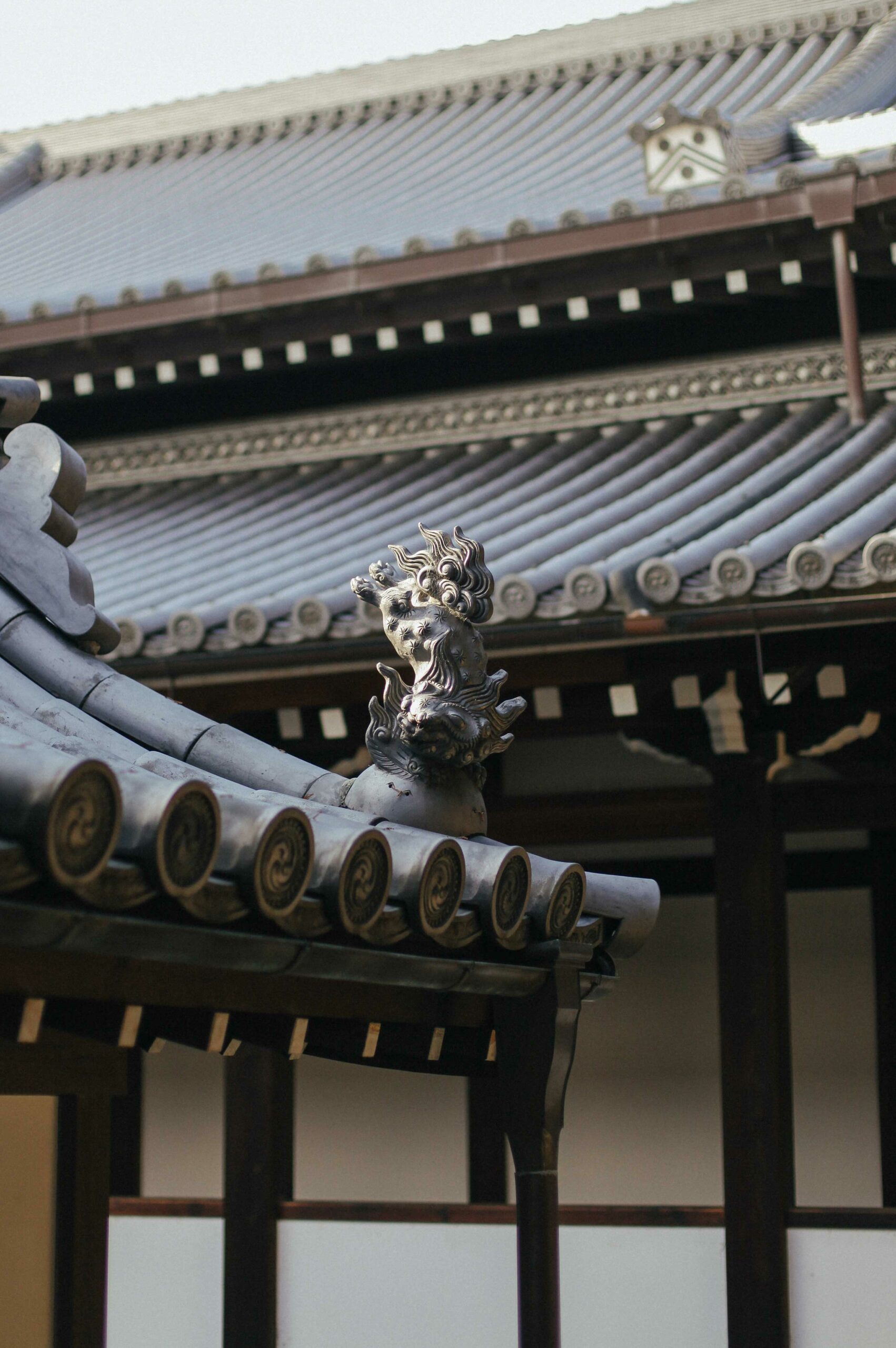 Flying lion-dogs adorn the roof corners at Nishi, offering protection from malevolent spirits.