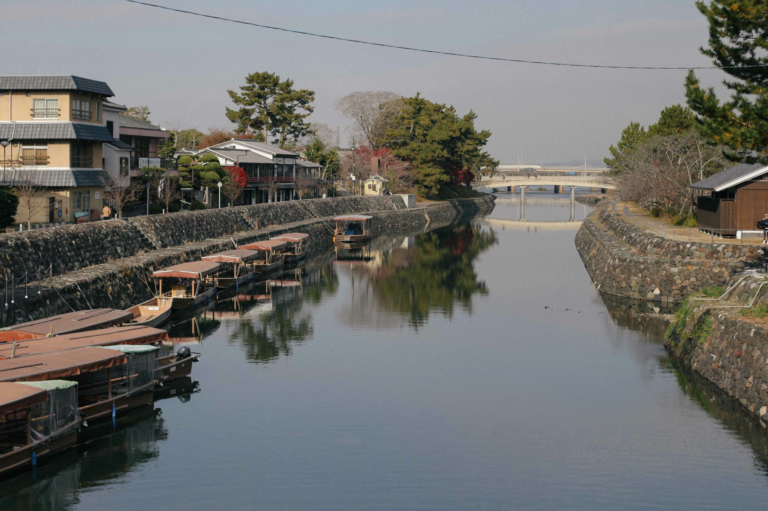 River Uji's minor tributary is still and calm on a fresh December morning.