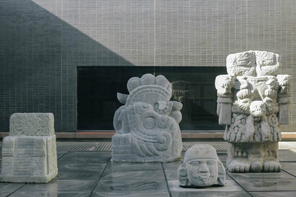 Courtyard displays of replica Aztec, Toltec and Mayan artefacts within the museum.