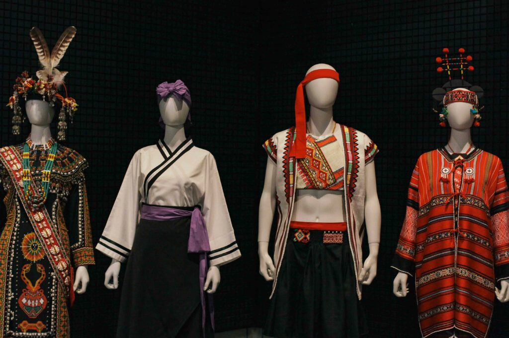 Within the Asia section of the museum, a large range of traditional clothing styles are displayed.
