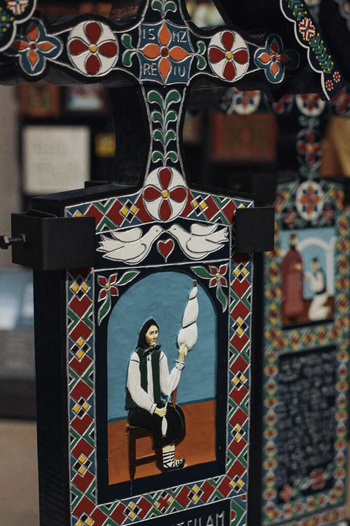 Romanian cemetery headstones from the famous 'Merry Cemetery' are also exhibited.
