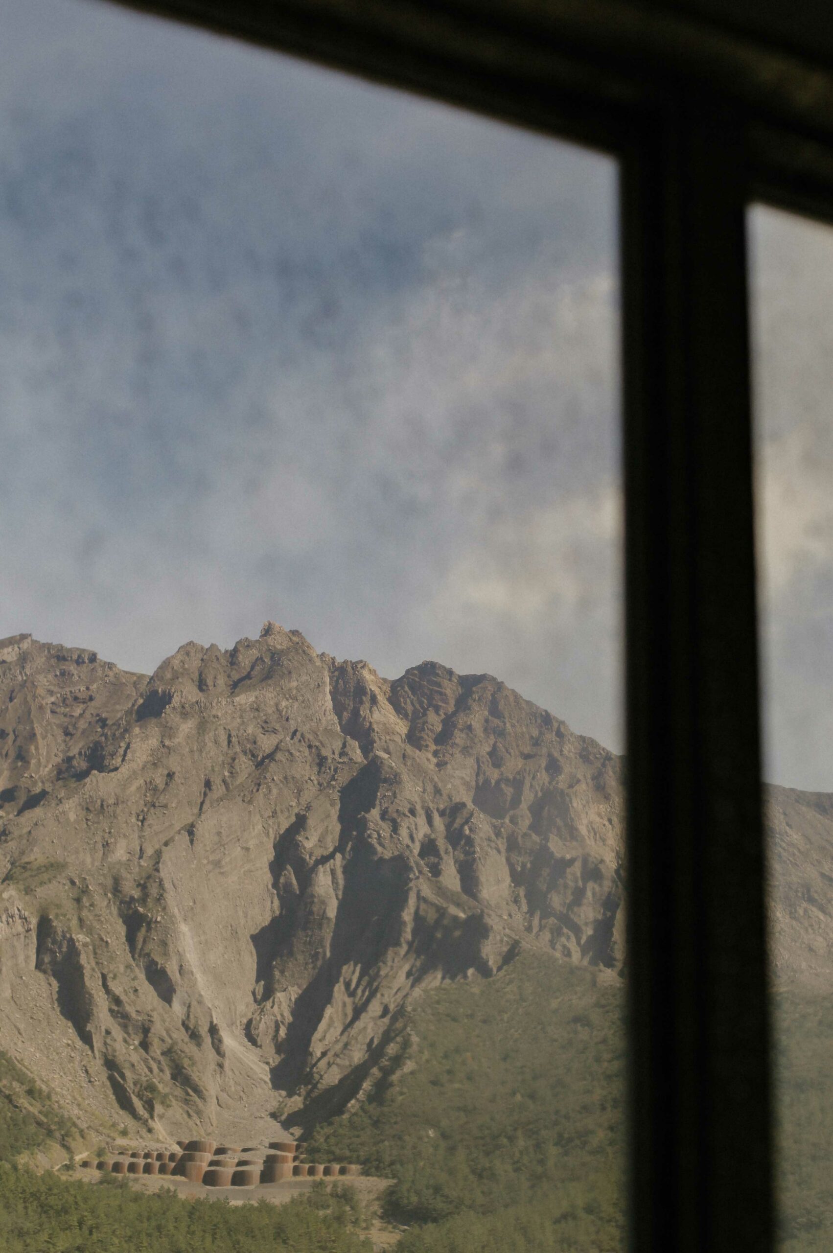 The volcano itself casts an ominous shadow over the surrounding landscape.