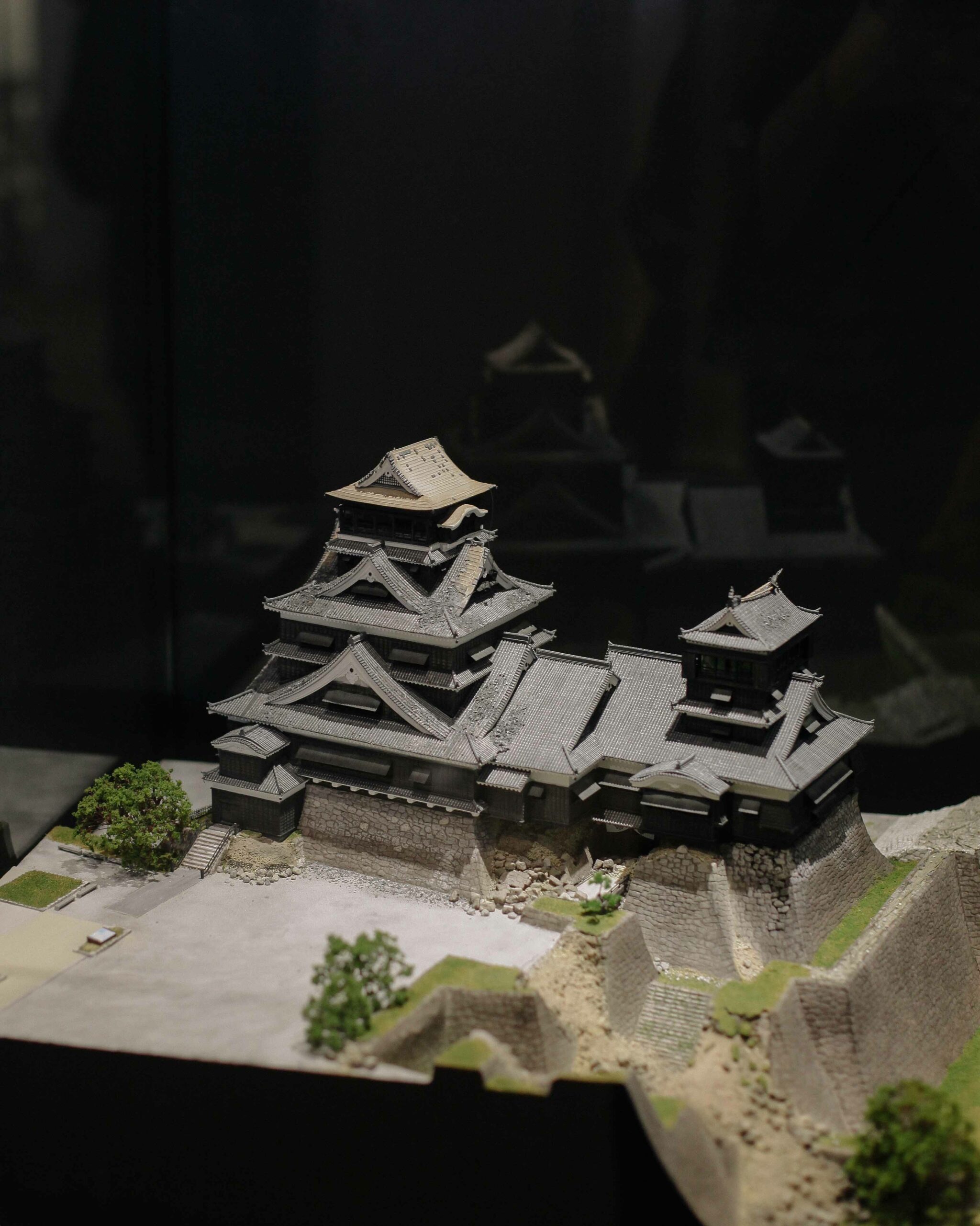 A tiny replica of Kumamoto Castle as it was immediately after 2016's earthquake damage.