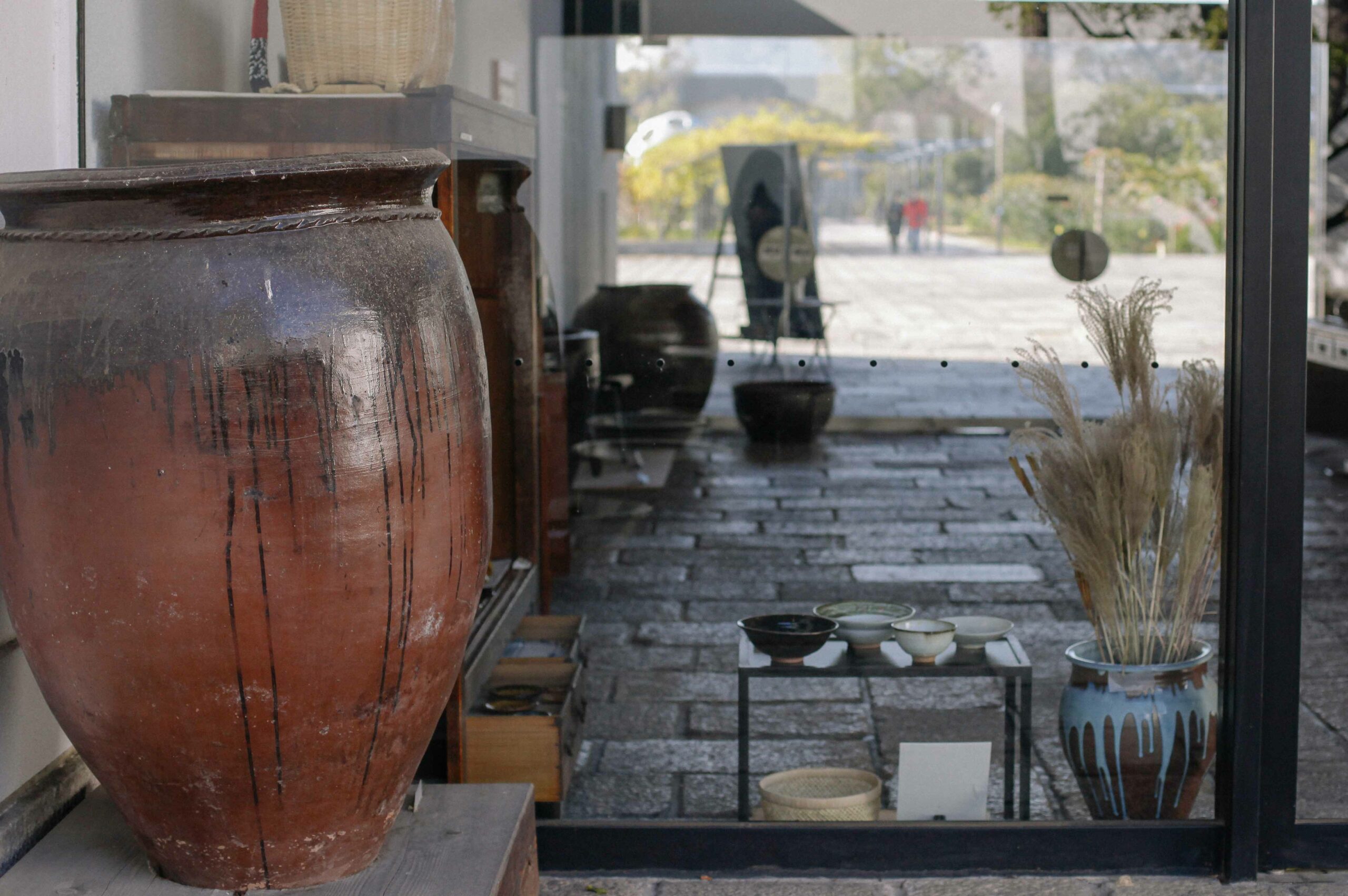 Enormous pots are kept in the courtyard.